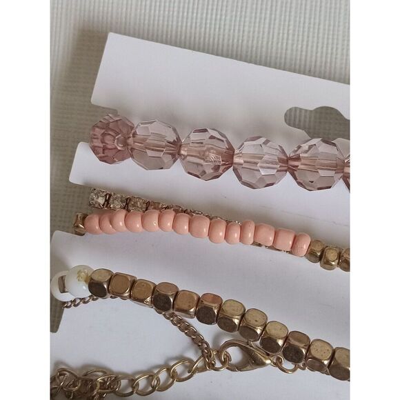 Charlotte Russe Set of 6 Gold Toned and Pink Assorted Beaded Elastic Bracelets - Picture 7 of 10